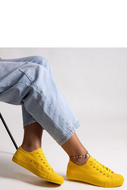 Solea Yellow Classic Nudar Sneakers highlighted from above, featuring a rounded toe and fashionable low-profile design for premium summer footwear.