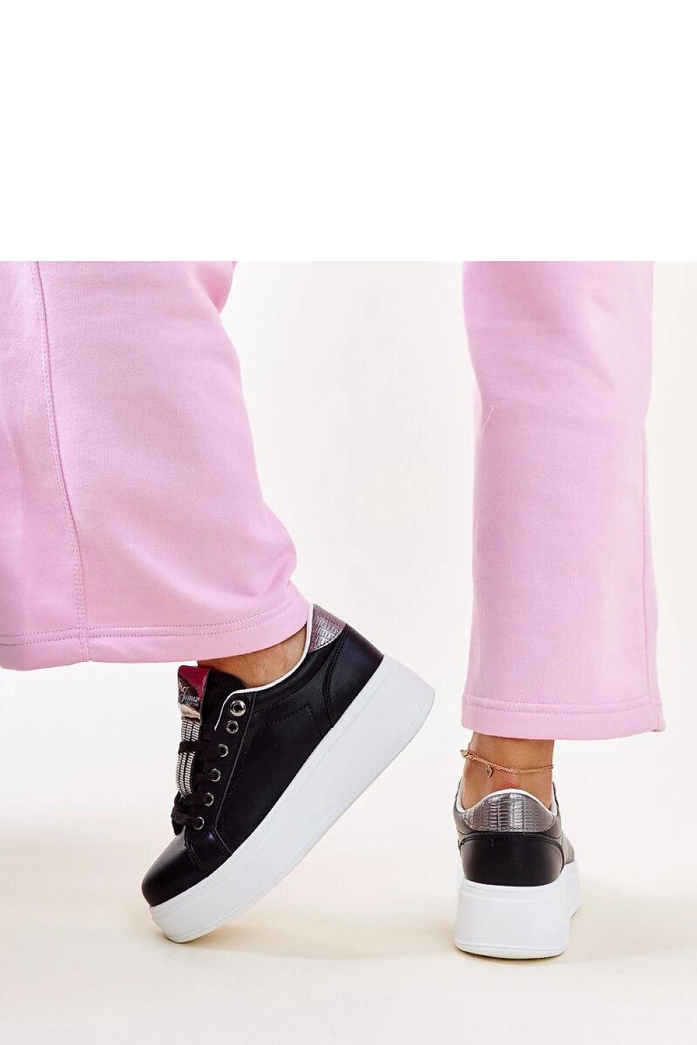 Elegant Solea black sneakers showcasing Maurizia zirconia embellishments, combining a modern aesthetic with classic comfort, ideal for the Spring/Summer season, available in sizes EU 36-41.