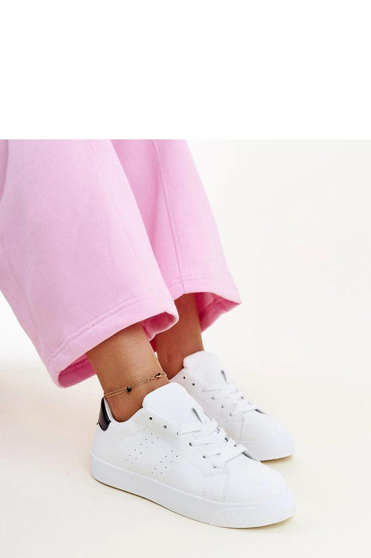 Close-up of Solea Akila Black and White Sneakers highlighting the high-quality synthetic leather and rubber sole, combining luxury with comfort for everyday wear.