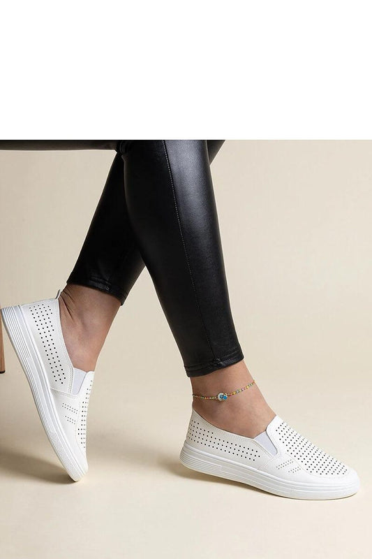 Elegantly crafted Solea Women’s White Slip-On Sneakers, showcasing a contemporary eco leather finish for a fashionable look.