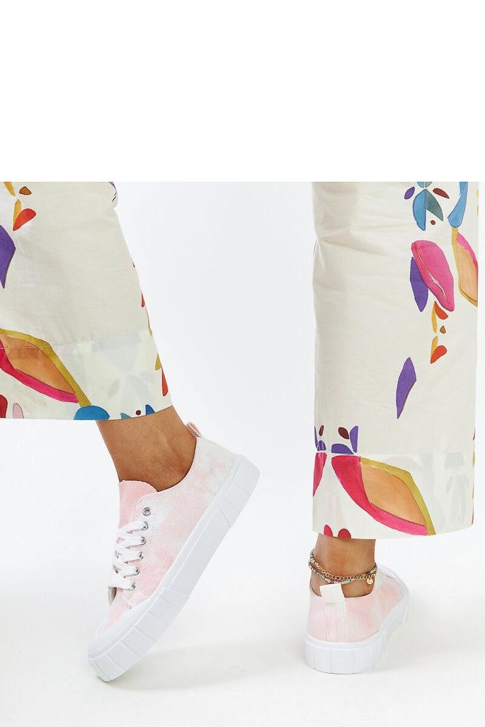 Full view of Solea light green Jerina Adidas sneakers displaying the soft fabric construction and contrasting white rubber sole, perfect for casual chic looks.