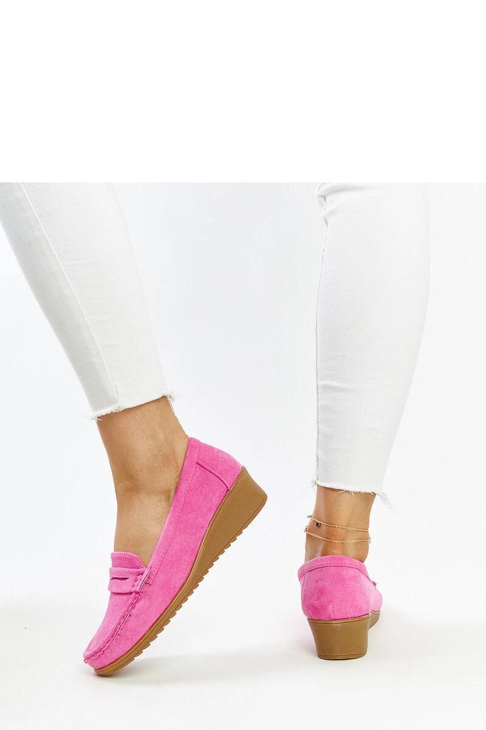 Close-up of Solea's luxurious blue suede loafers Sakena, highlighting the high-quality eco-friendly suede leather and chic wedge heel for a sophisticated look.