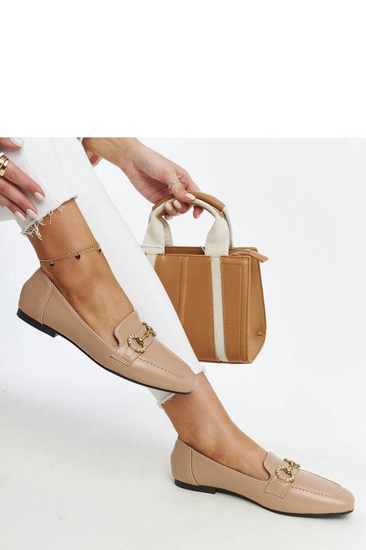 Close-up of Solea's Areebah moccasins showcasing high-quality eco leather and intricate rhinestone detailing on the buckle, emphasizing luxurious craftsmanship.