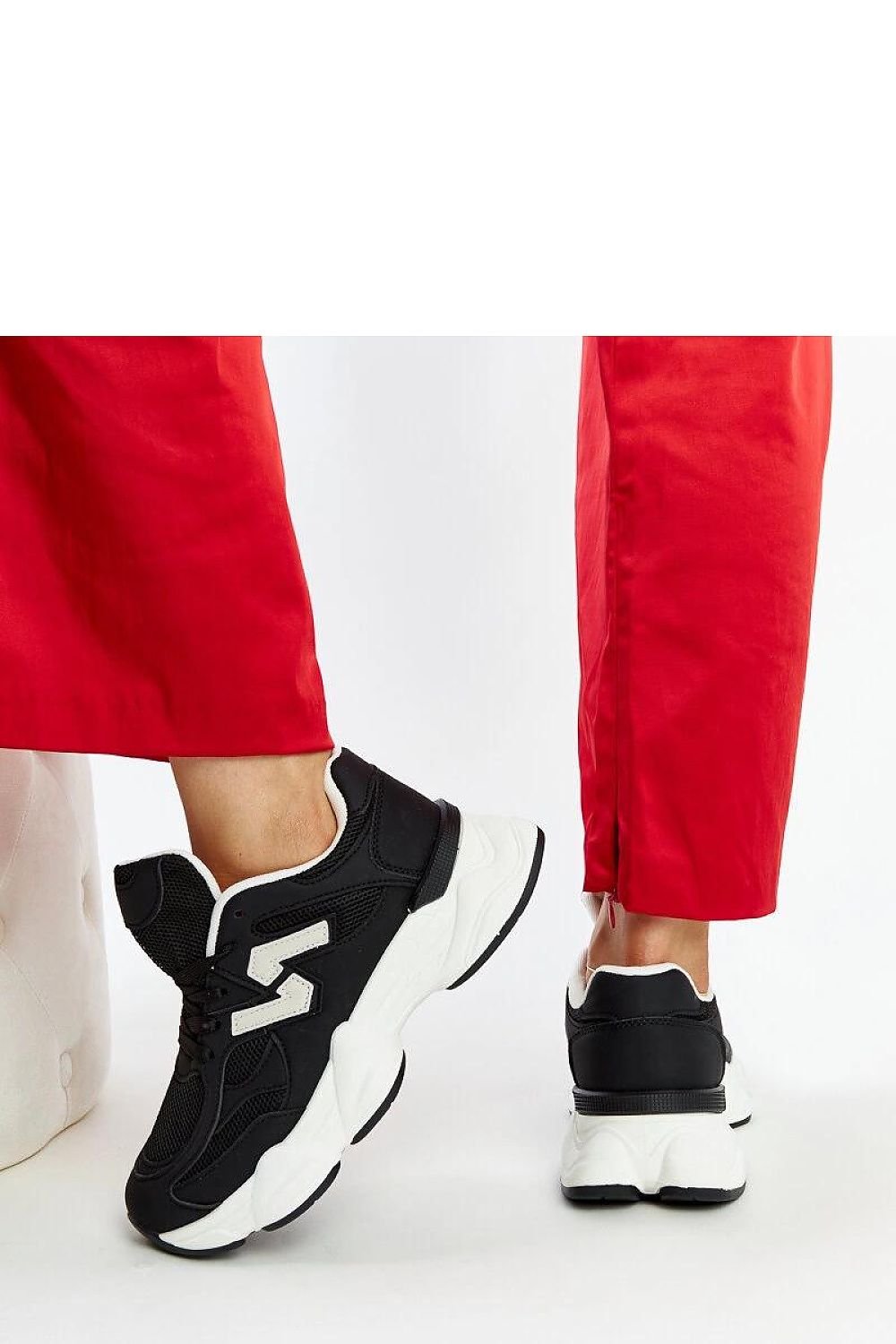 Solea black sneakers with chunky sole and heel height of 5.5 cm, combining comfort and style effortlessly.