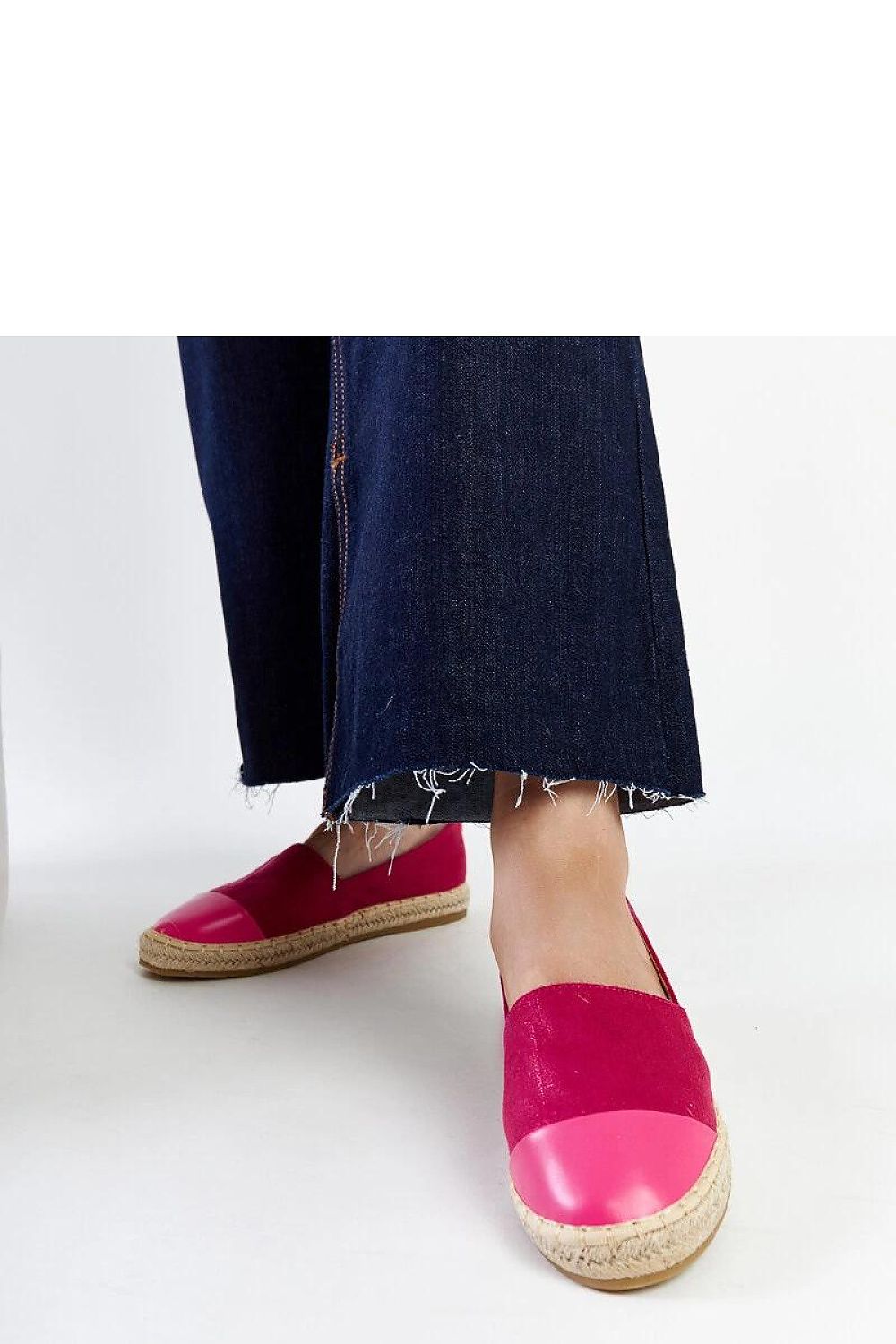 Solea pink Carugo espadrilles displayed against a minimalist background, highlighting the luxurious fabric and comfortable fit for spring and summer.