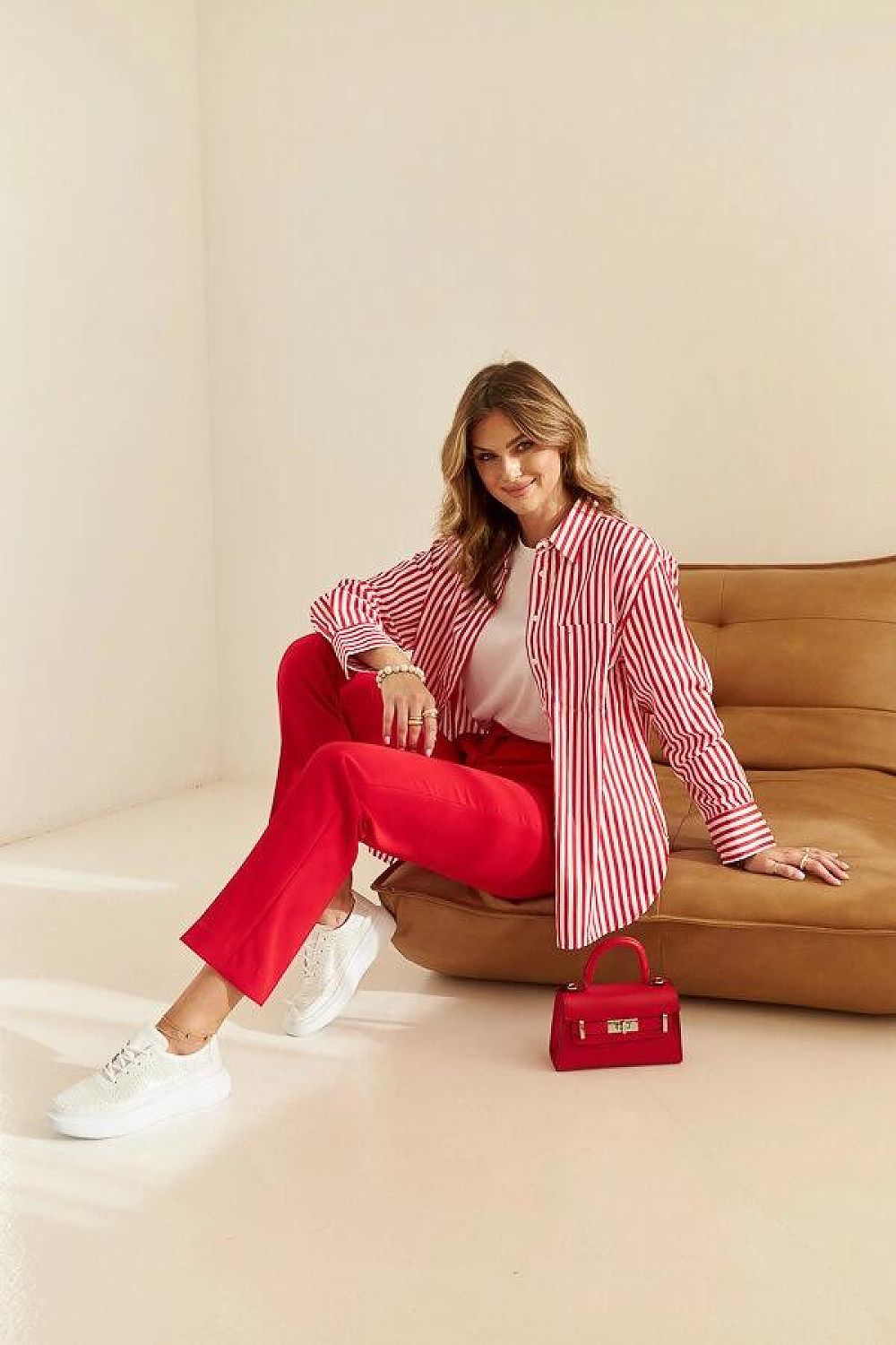 Solea's Lori Vegan Leather Golden Platform Sneakers displayed in a chic setting, emphasizing their fashionable appeal for modern summer outfits.