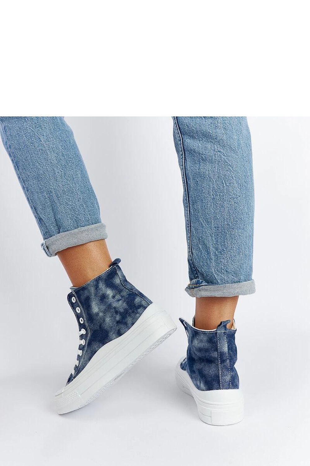 Fashionable lace-up navy blue platform sneakers from Solea, providing elegance and versatility for both day and evening outfits.