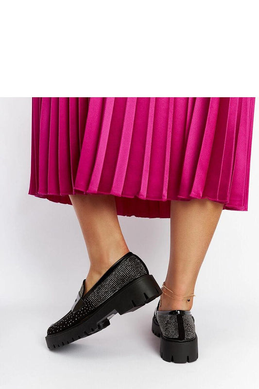 Close-up detail of the Solea black moccasins, showcasing the exquisite zircon embellishments on eco-leather, perfect for a stylish summer look.