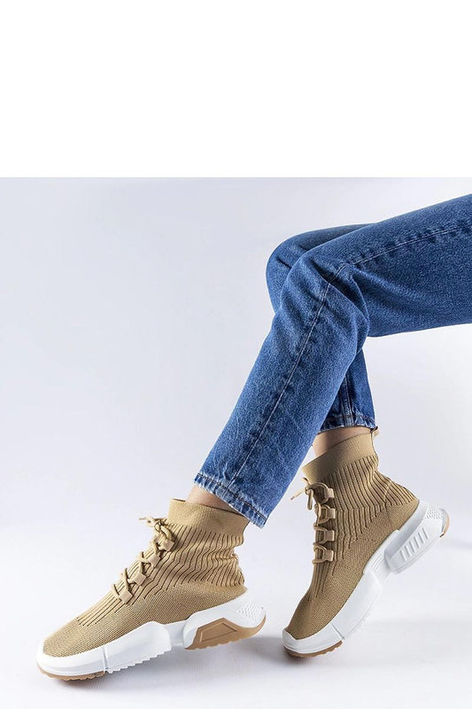 Comfortable high top sneakers in dark beige by Solea, showcasing a sleek silhouette ideal for both casual and sporty looks, available in various sizes.