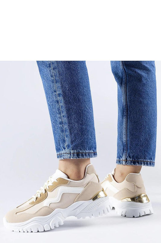 Close-up of Solea beige sneakers showcasing the exquisite laced detail and breathable material, perfect for warm weather outings.