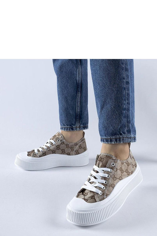 Close-up view of Solea Brown Sneakers with Cavi Monogram, highlighting the high-quality rubber sole and fashionable design.