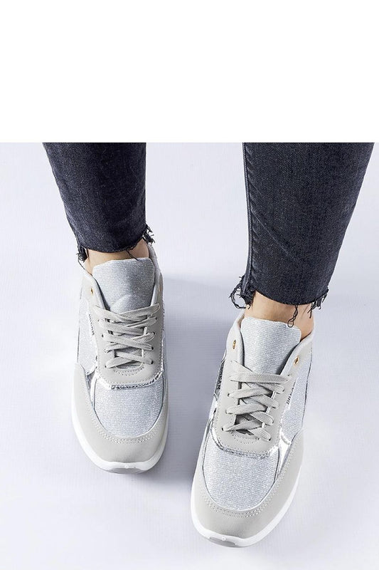 Close-up of Solea gray brocade lace-up sneakers, highlighting premium materials and sophisticated craftsmanship for comfort and style.