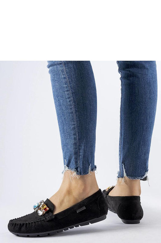 Chic black loafers made from high-quality eco-leather by Solea, featuring a comfortable slip-on design ideal for both casual and formal occasions.