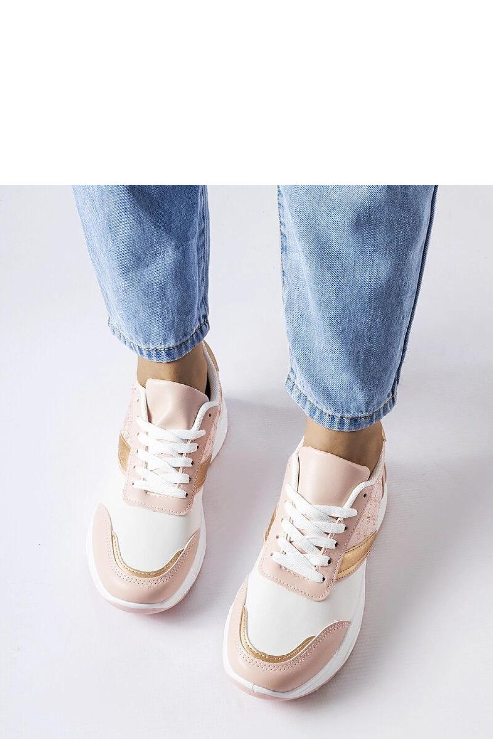 Showcasing Solea eco leather sneakers in beige and white, ideal for fashion-forward individuals who value comfort and style.