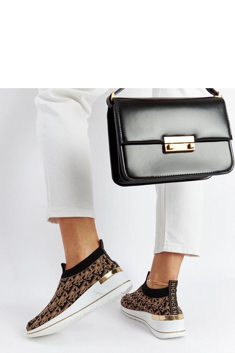 Chic Solea Black-Brown Slip On Tartano Shoes worn in a casual summer setting, exemplifying effortless elegance and modern design for all-day wear.