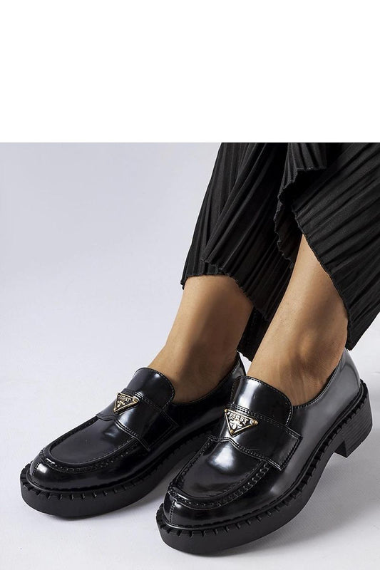 Close-up of Solea black women's moccasins, showcasing high-quality eco leather and chic slip-on design for effortless style.