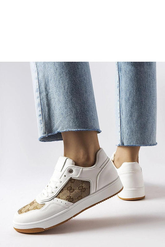 Close-up of Solea Isidora white sneakers showcasing the luxurious eco leather texture, a round toe, and lace-up design ideal for sophisticated casual wear.