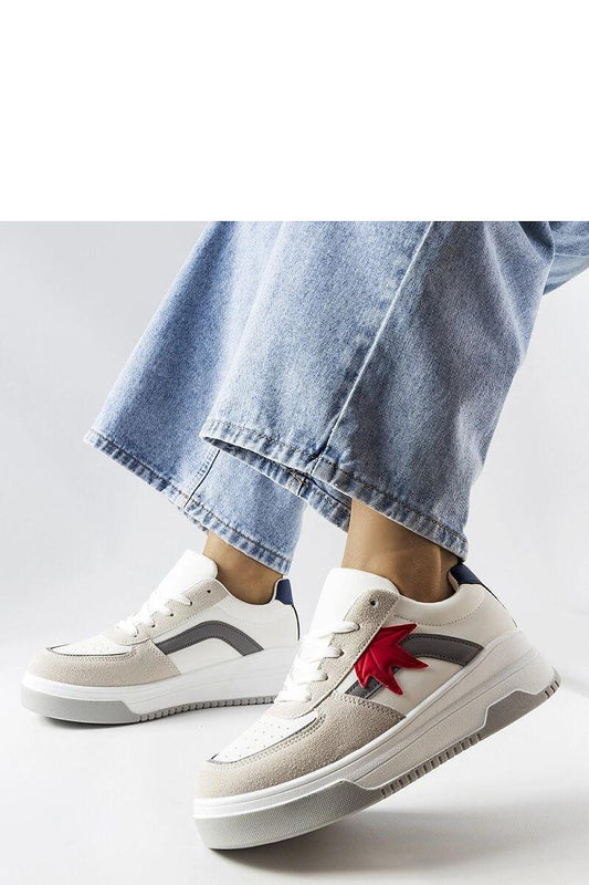 Close-up of luxurious eco-suede insert on Solea's eco-leather white sneakers, showcasing premium craftsmanship and attention to detail.