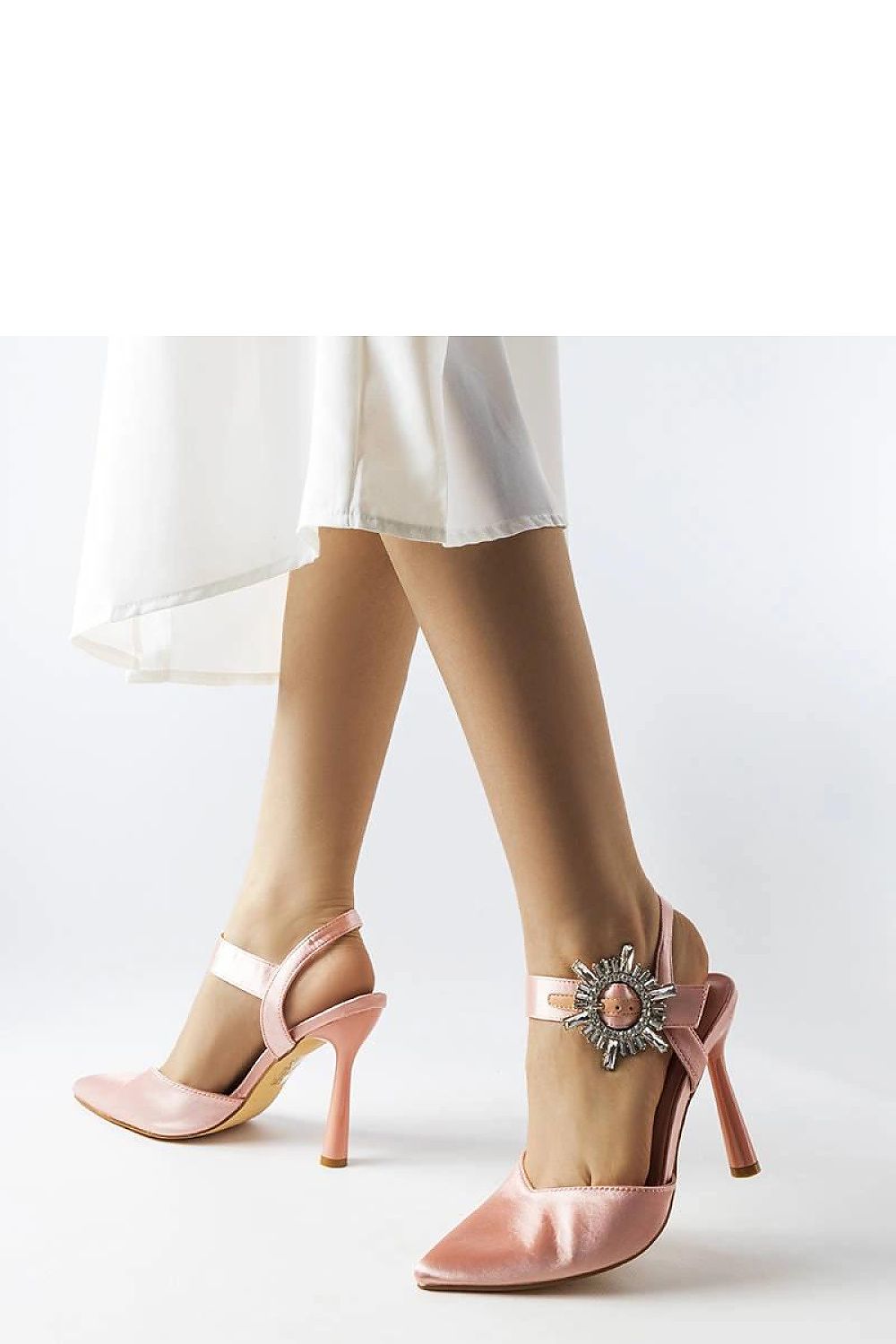 Stylish summer fashion with Solea's beige spike-heeled sandals, highlighting an elegant 11cm heel and a sophisticated satin finish.