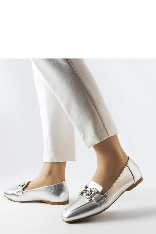 Close-up view of Solea silver moccasins adorned with decorative zircons, highlighting their luxurious eco-leather texture and sophisticated look.