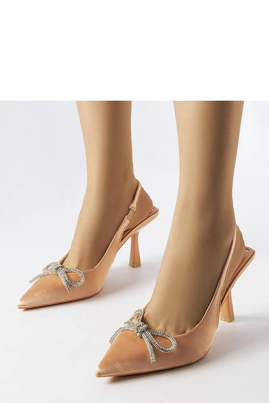 Close-up view of Solea Elegant Beige High Heel Pumps with Bow, emphasizing the exquisite bow detail and elegant silhouette enhancing any woman's wardrobe.