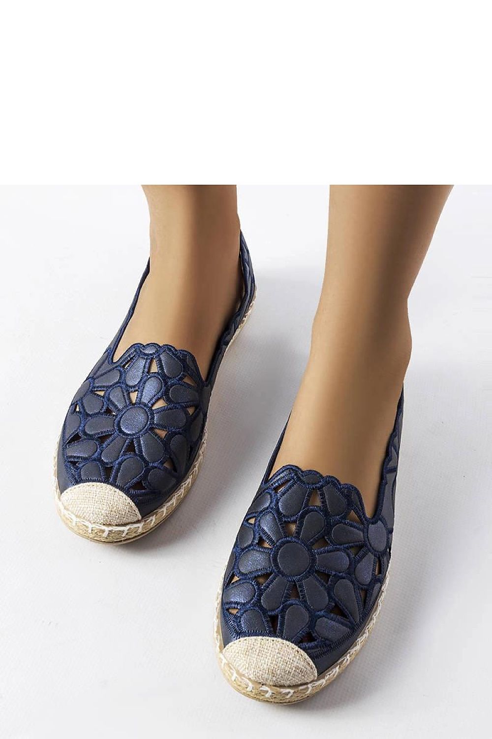 Solea navy blue eco leather espadrilles displayed on a sandy beach, exemplifying chic summer footwear suitable for beach and city walks.