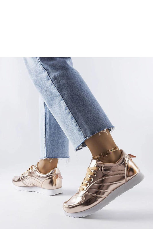 Elegant Solea Golden Quessy Summer Sneakers showcasing a chic lace-up closure, perfect for enhancing summer outfits.