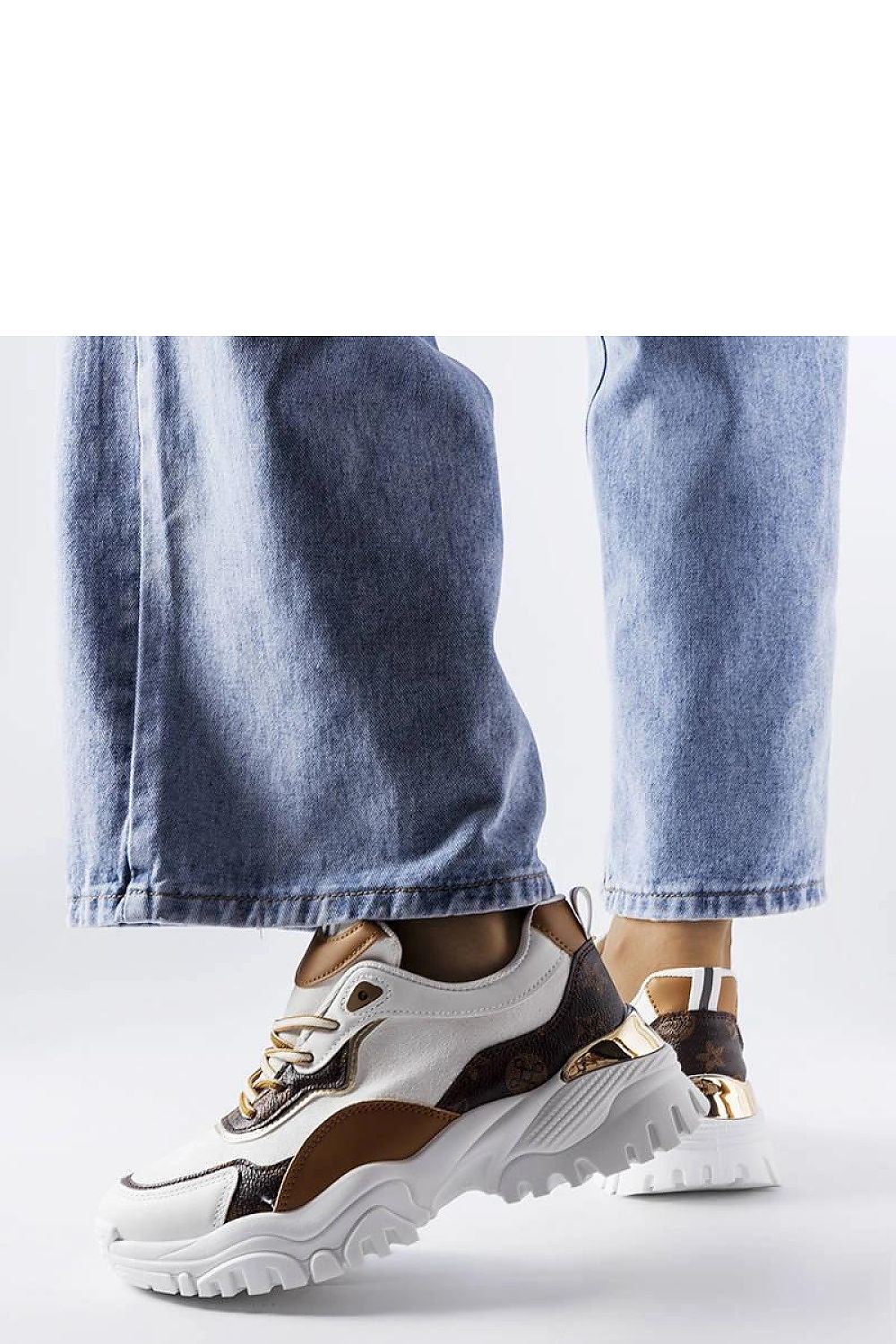 Solea white sneakers displayed against a minimalist backdrop, highlighting the perfect blend of style, comfort, and high-quality design.