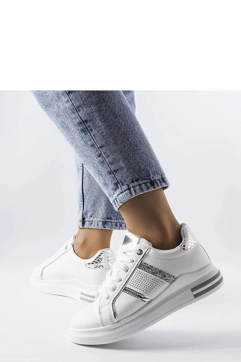 Trendy beige sneakers adorned with rhinestones by Solea, designed for fashionable women who appreciate elegance and comfort.