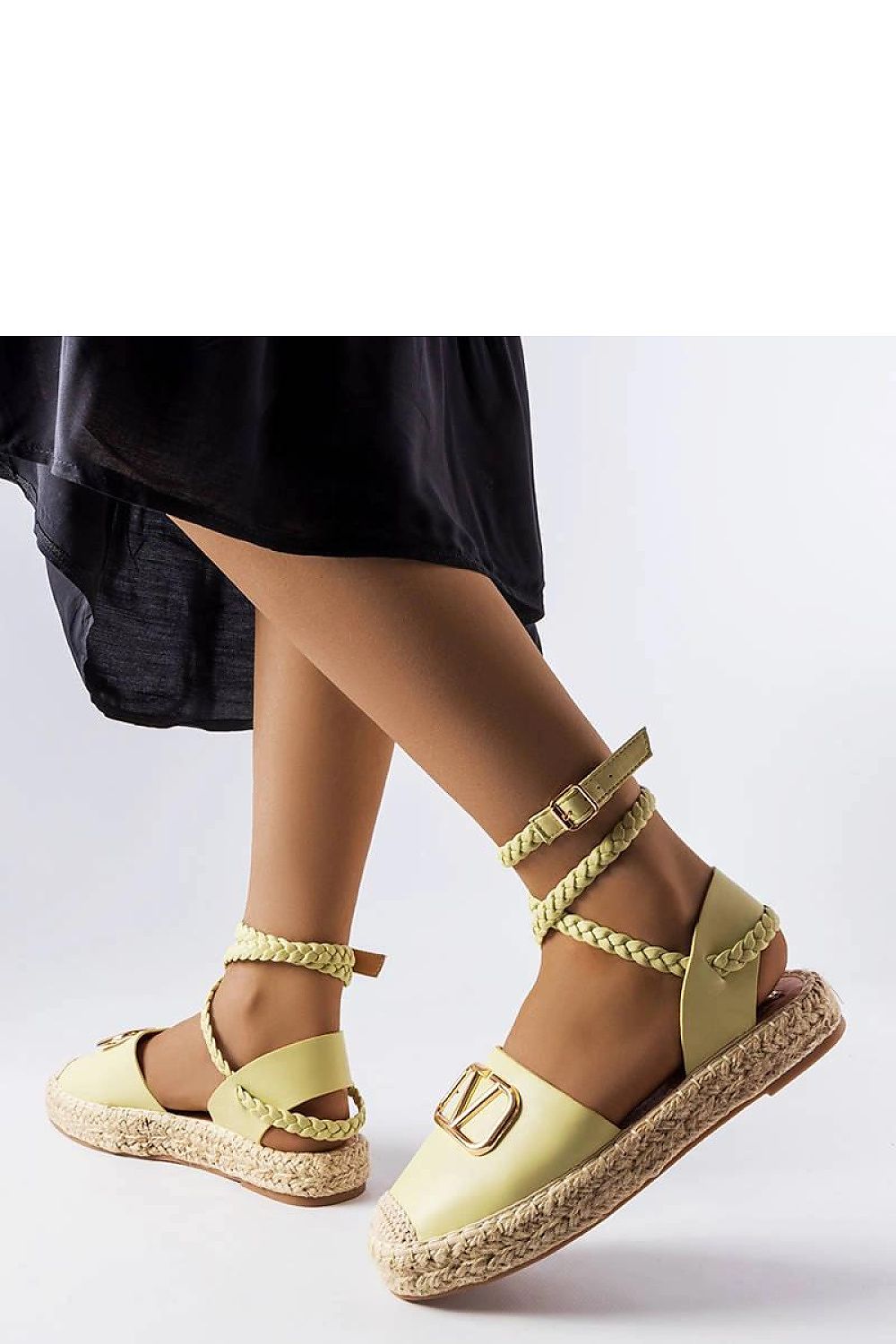 Solea's Eco Leather Green Tied Espadrilles, featuring a chic design and comfortable beige rubber sole, ideal for stylish summer outings in EU sizes 36-41.
