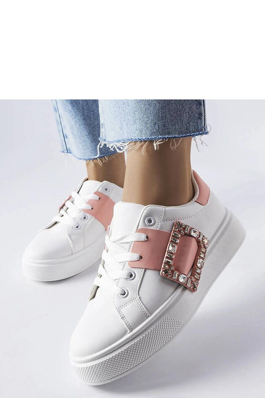 Elegant Solea women's white sneakers with pink Ike clamp detail, highlighting their versatility and perfect fit for casual summer wear.
