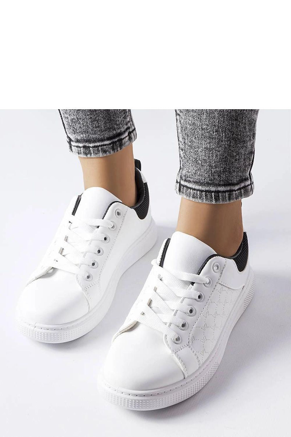 Solea luxury black sneakers, showcasing detailed Dreux embossing, designed for a chic summer look.
