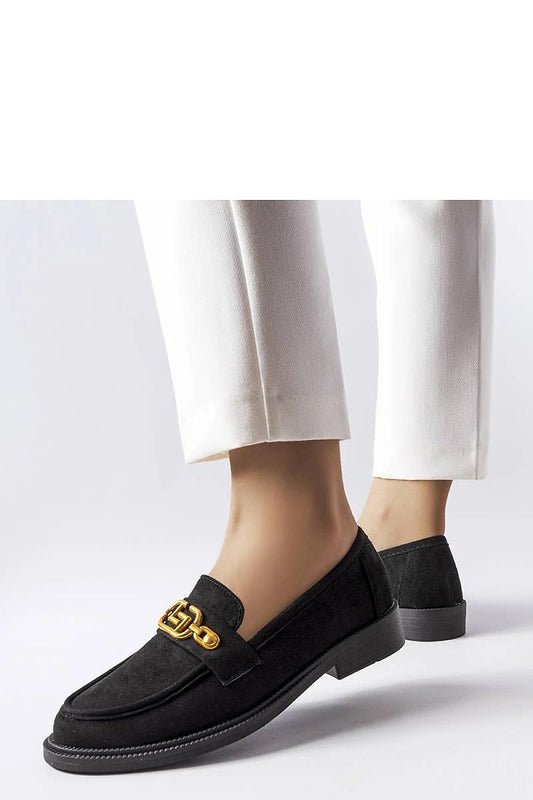 Close-up view of Solea's luxurious eco suede moccasins, showcasing detailed Ouellet embellishments and comfortable design.