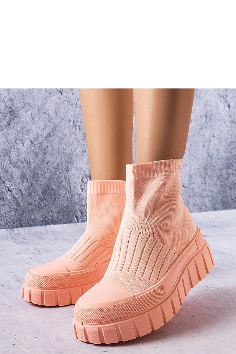 Stylish and chic Solea pink sock sneakers for women, featuring a lightweight fabric construction, ready for warm weather adventures.