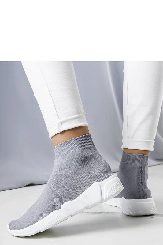 Close-up of Solea grey slip-on sneakers for women highlighting high-quality fabric and fresh white rubber sole, ideal for summer wear.