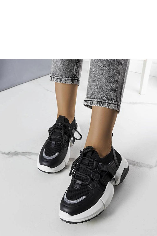 Close-up of Solea Black Sock Sneakers Peggy highlighting the comfortable fit and stylish design, ideal for sophisticated summer outfits.