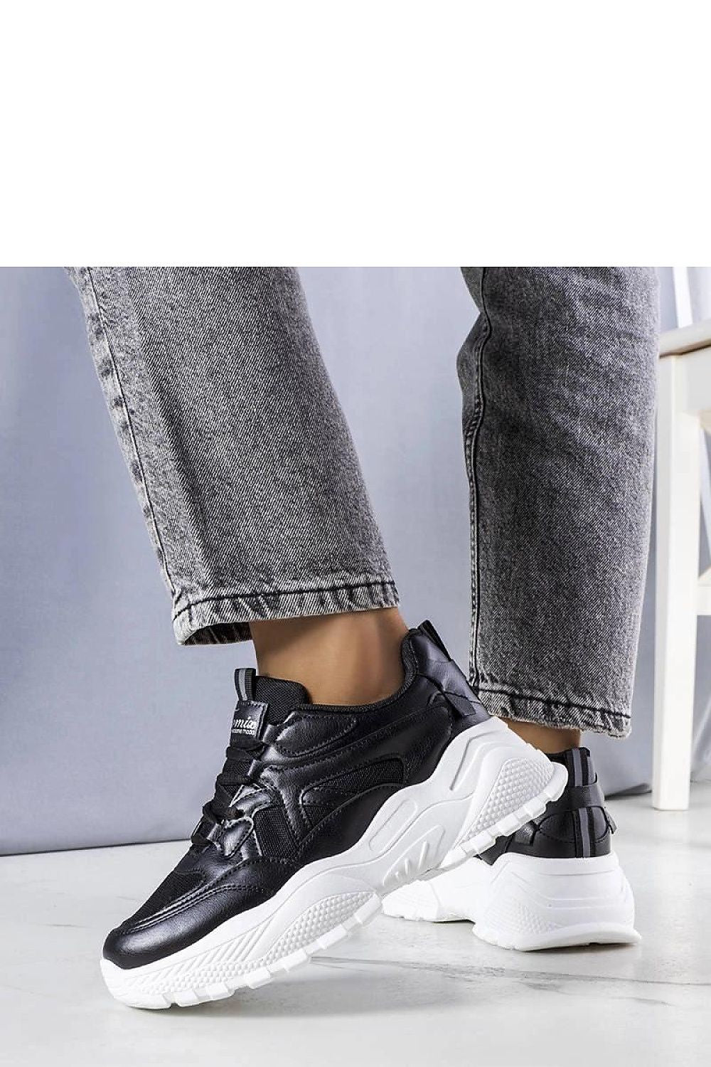 Solea black sneakers displayed with detailed size options EU 36-41, highlighting their fashionable and comfortable design for everyday elegance.