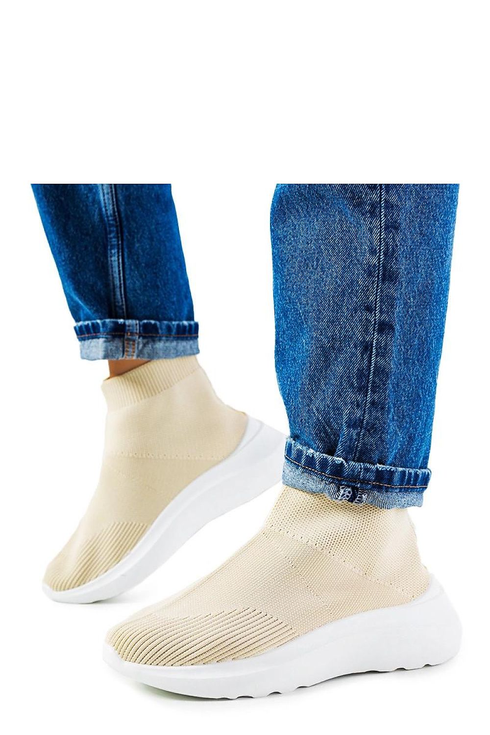 Fashionable Solea Jennifer beige high sneakers displayed in a chic summer setting, epitomizing comfort and modern style.