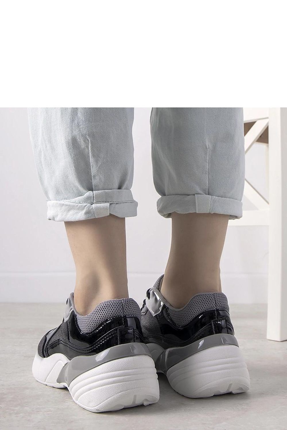 Solea Rude metallic silver high sole sneakers featuring a durable white rubber sole, designed for comfort and style in the cooler seasons.