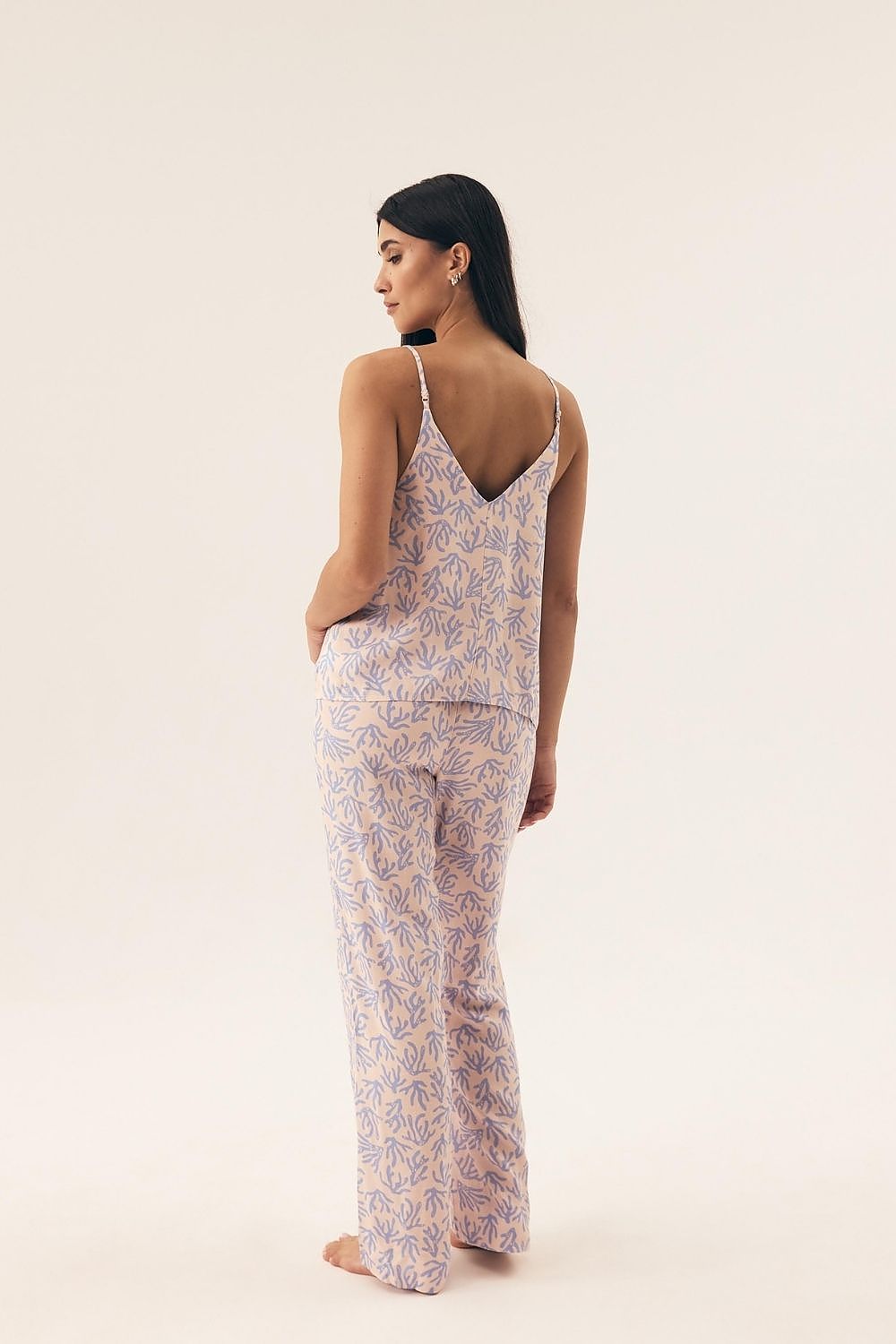 Luxurious women's cotton pajama ensemble with a feminine V-neck design and adjustable straps, designed by Henderson, perfect for stylish sleepwear.