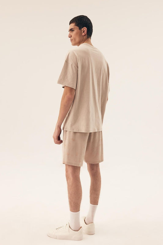 Luxurious Henderson Men's Cotton Pyjamas Set featuring a short-sleeved tee and knee-length shorts, elegantly designed for comfort and style, ideal for warm nights.