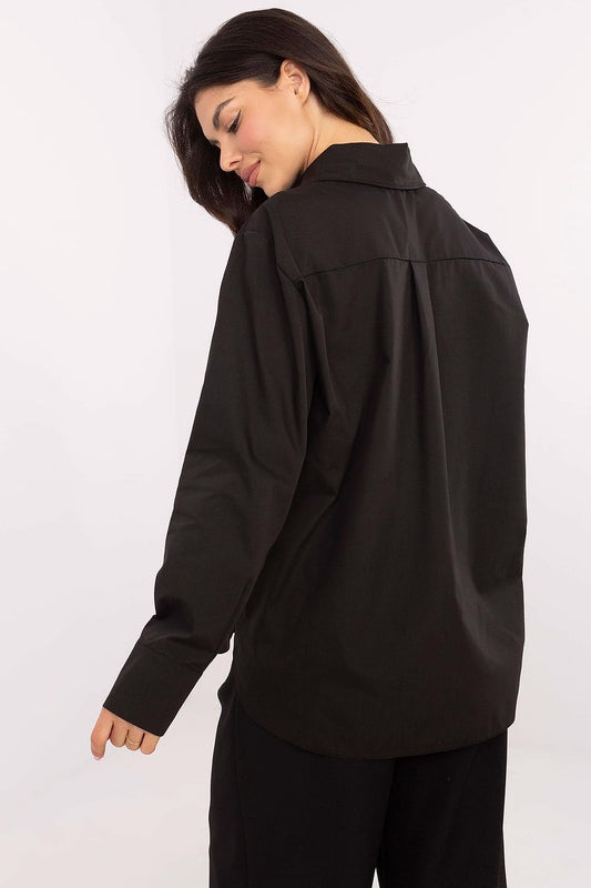 Close-up of the luxurious fabric of the Lakerta women's long sleeve cotton shirt, highlighting the quality cotton blend and exquisite design.