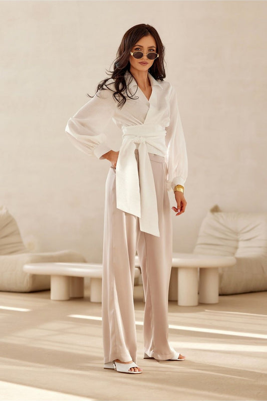 Luxury cropped blouse by Roco Fashion featuring a collar and tie waist with long puffy sleeves, perfect for elegant occasions.