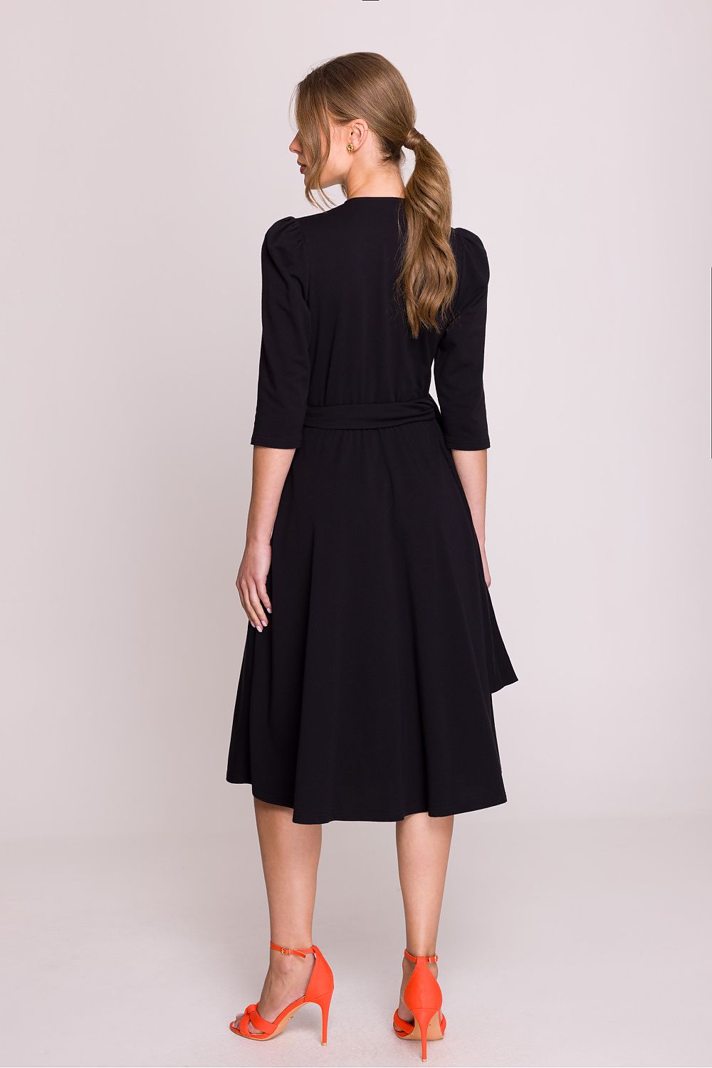 Flat lay of Stylove's Elegant V-Neck Modal Daydress in various sizes, showcasing the breathable modal fabric and luxurious elegance suitable for any occasion.