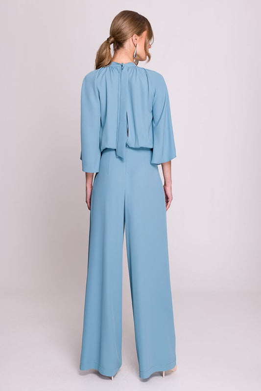 Close-up of Stylove jumpsuit detailing, highlighting the delicate ruching and stand-up collar, ideal for a refined look.
