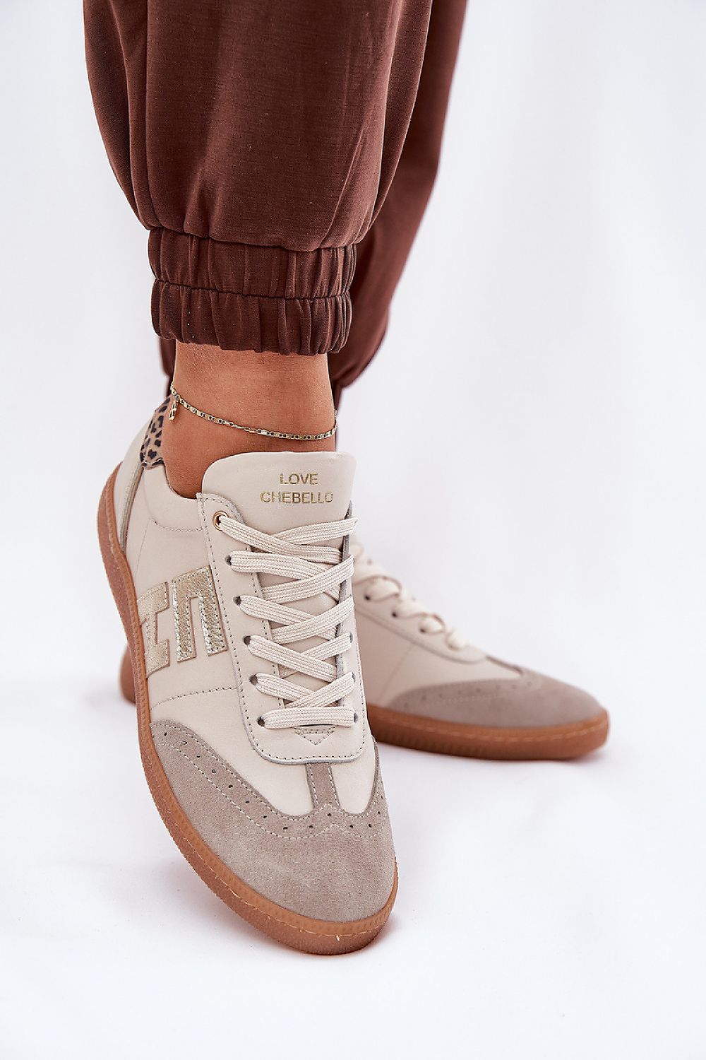 Luxury women's sports shoes from Step in Style, crafted from natural leather and suede, available in EU sizes 36-40. Featuring rounded toes and a stiffened heel for enhanced stability, ideal for both sporty and casual outfits.
