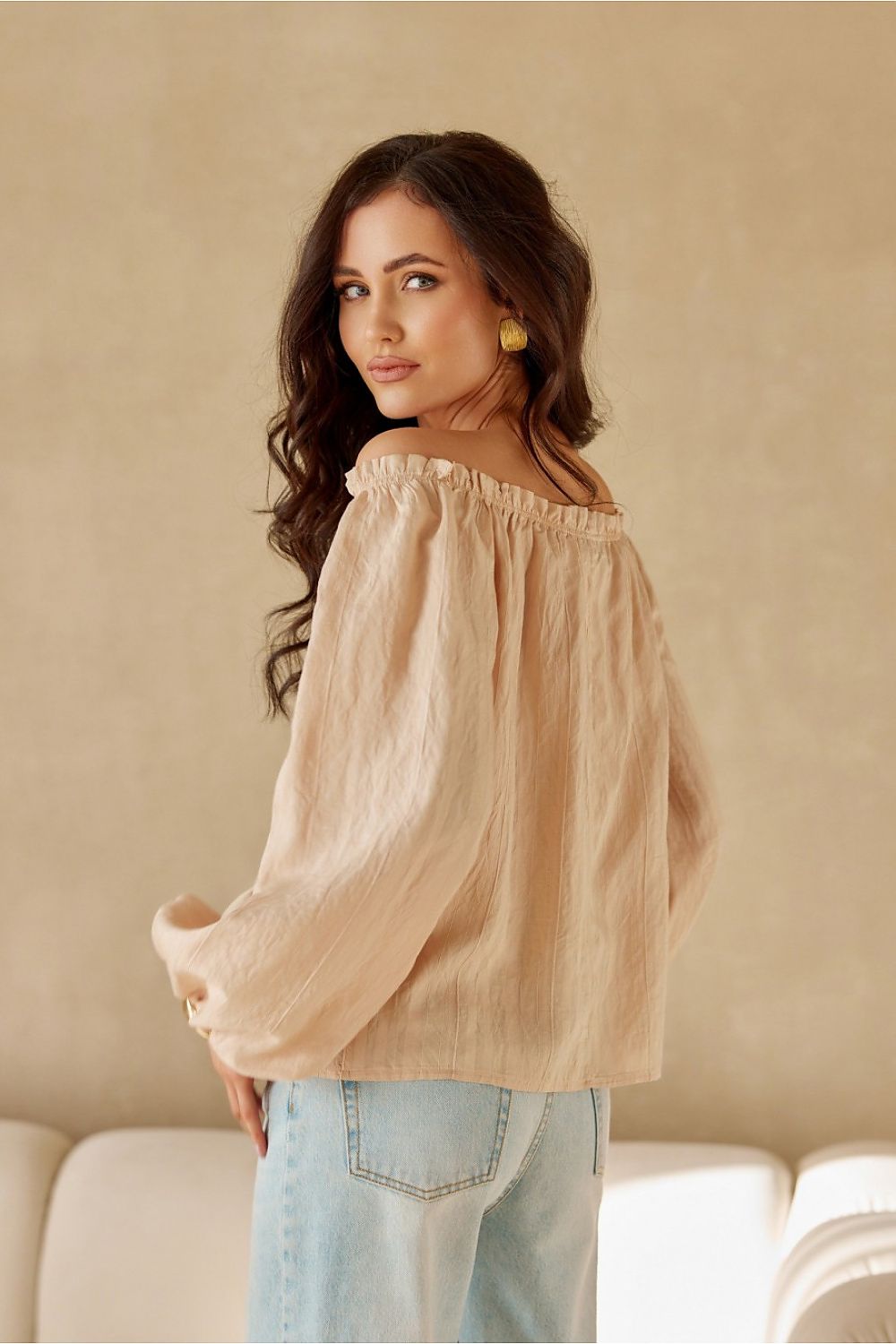 Elegant Roco Fashion blouse in a soft nylon and viscose blend, featuring a sophisticated silhouette with puffy sleeves for sizes EU 36 to 40.