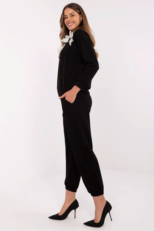 Sophisticated Italy Moda Women's High Waist Pants with side slip pockets and cuffs, perfect for casual styling and blending style with comfort.