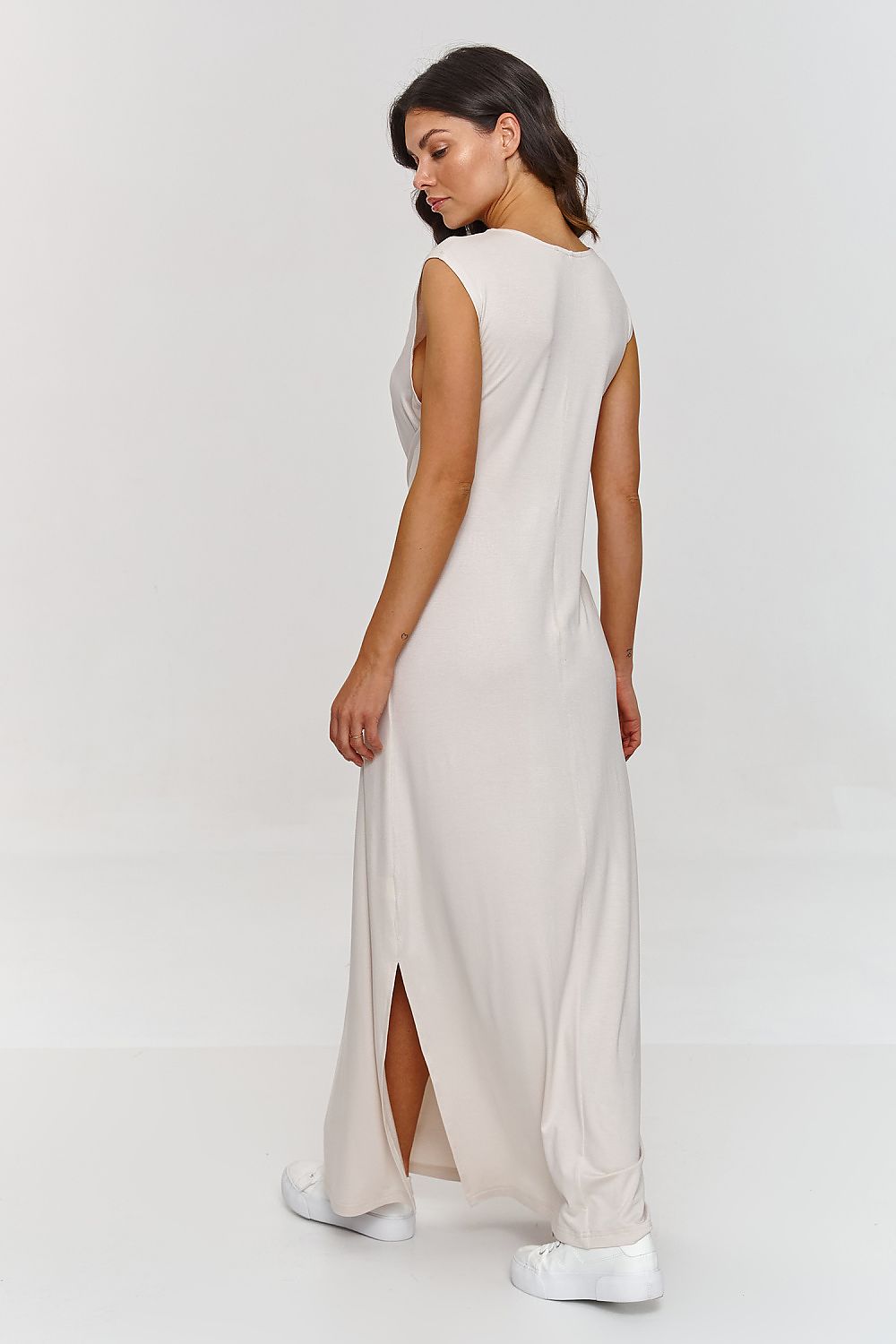 Refined Makadamia maxi dress with vibrant spring colours, elegantly designed with a comfortable waist tie and flirtatious side slit.