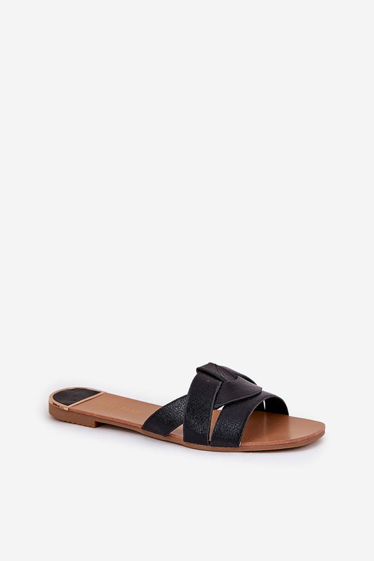 Close-up view of the interlacing strap design on women's elegant flat slippers from Step in style, showcasing refined craftsmanship.